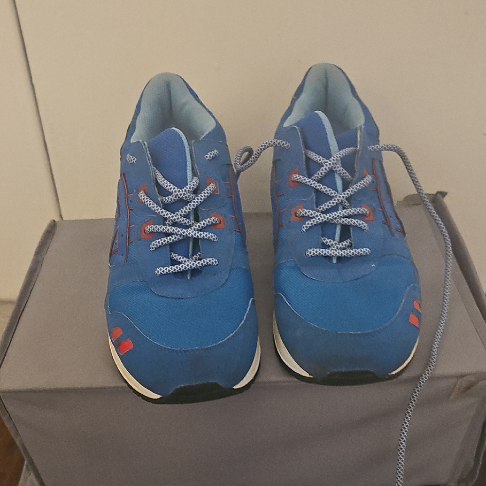 Blue Sneakers with Red Accents